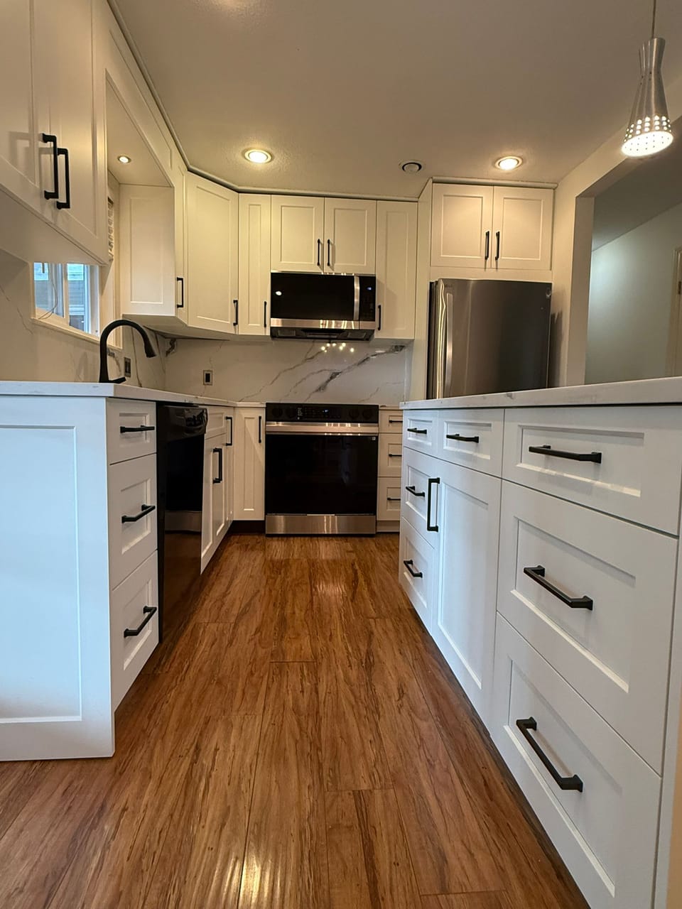Galley kitchen with drawer banks